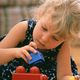 Jill Tyn, 4, perilously close to danger.